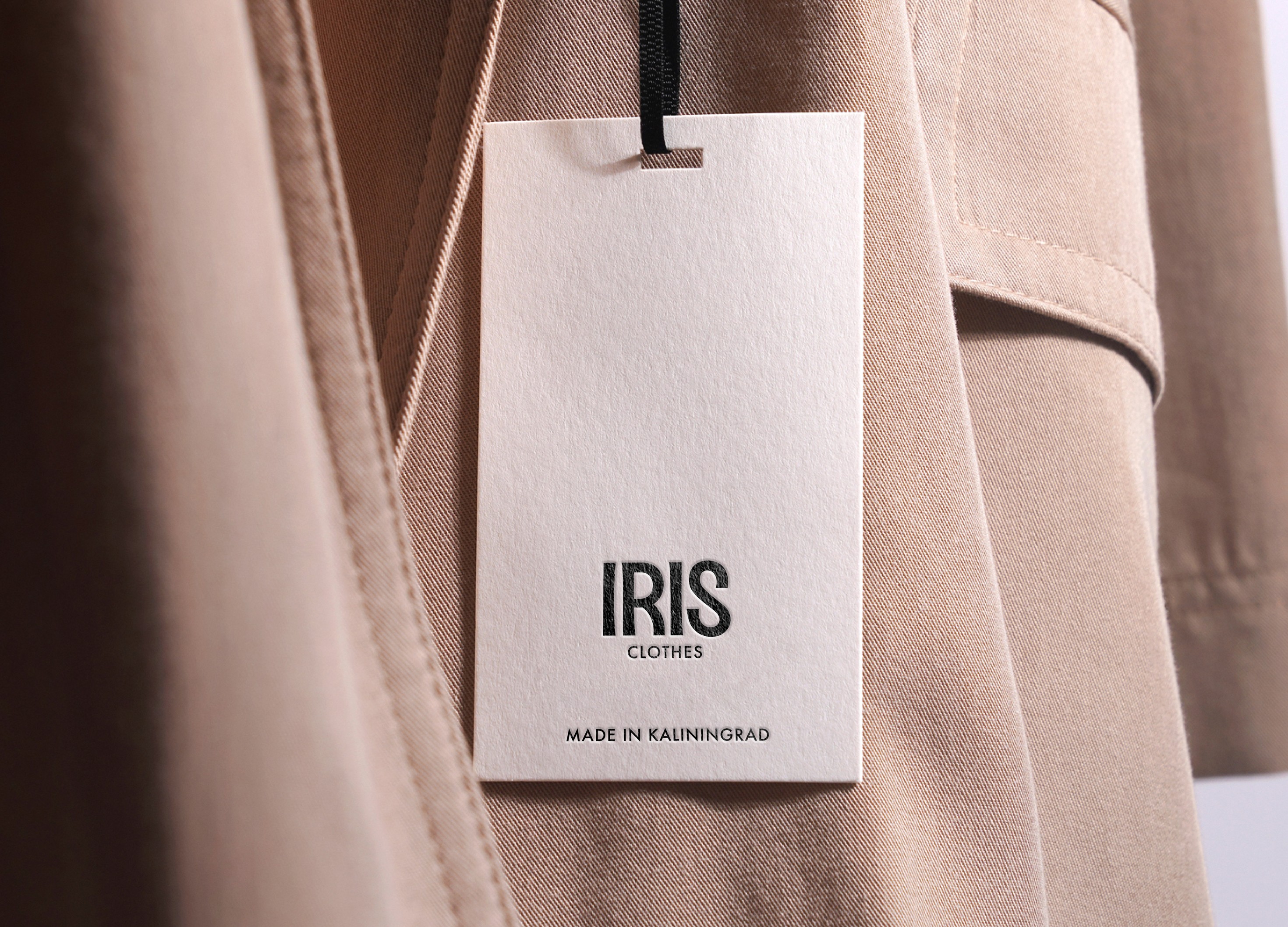 Дизайн брендированной бирки для верхней одежды